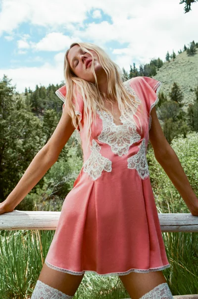 Photo of Luna Rose Mini Dress in Pink on model, view 1