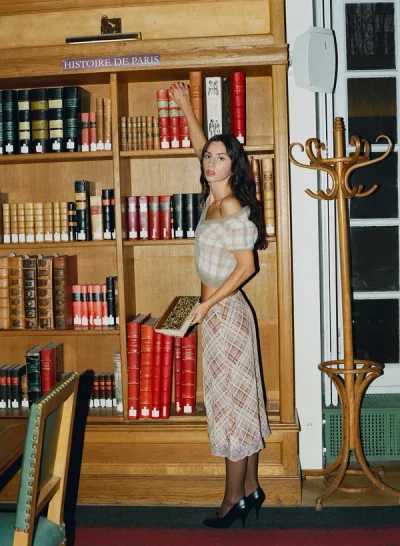 Photo of Poet Plaid Midi Skirt in Purple on model, view 1
