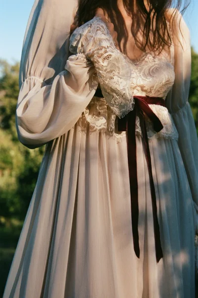 Photo of Bailey Maxi Dress in Ivory on model, view 1