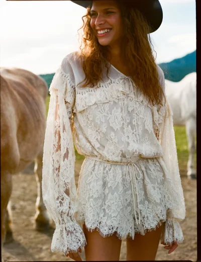 Photo of Country Rose Lace Romper in Ivory on model, view 1