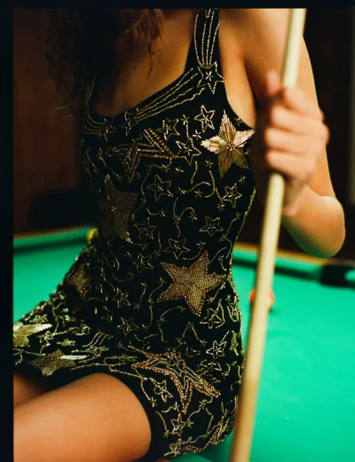 Photo of Shooting Stars Beaded Mini Dress in Black on model, view 1